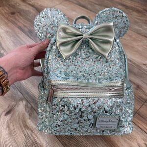 Loungefly Disney Parks Ice Blue Sequin Backpack with Bow